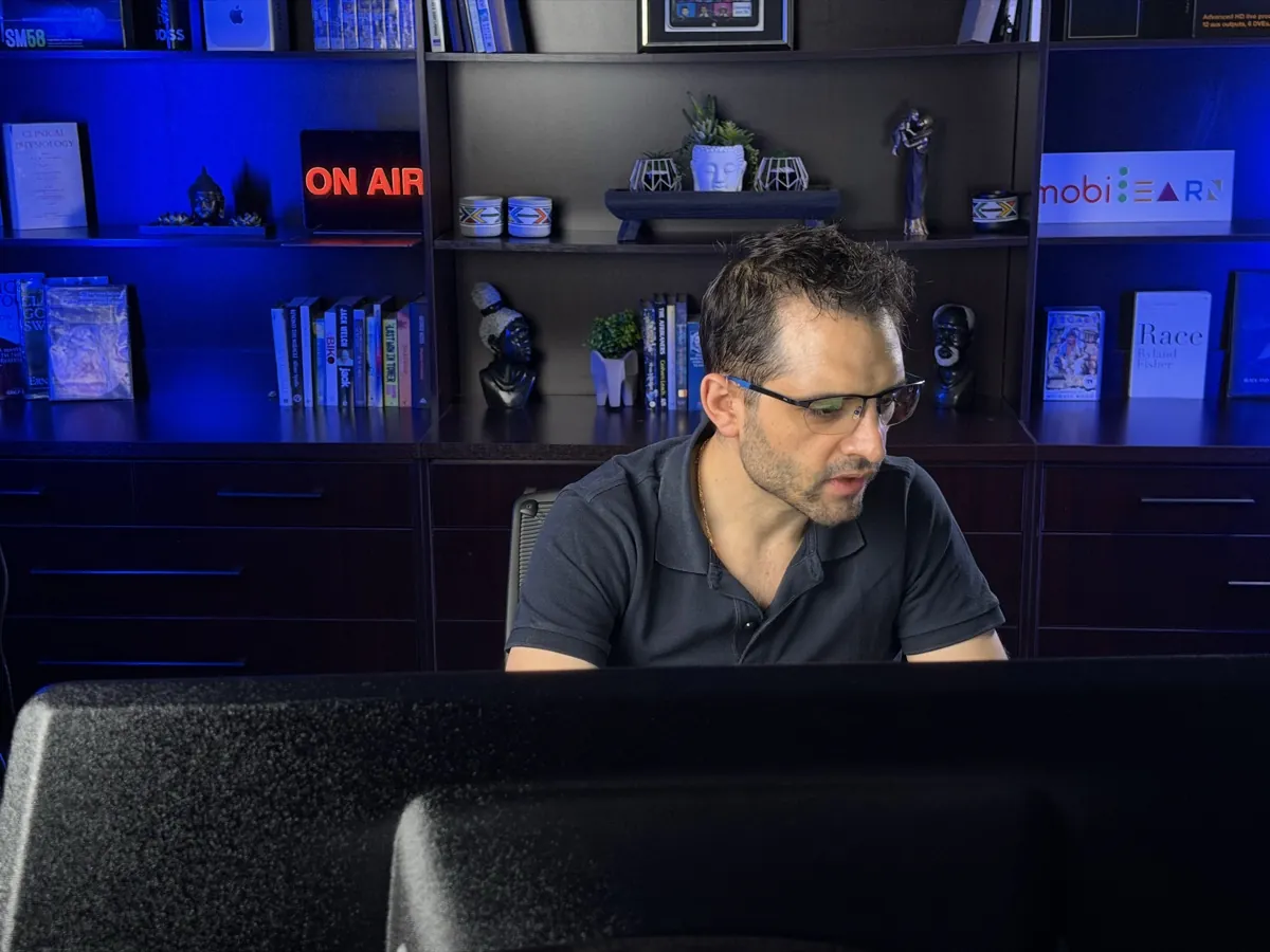 Specialist on camera with the Medilearn studio backdrop